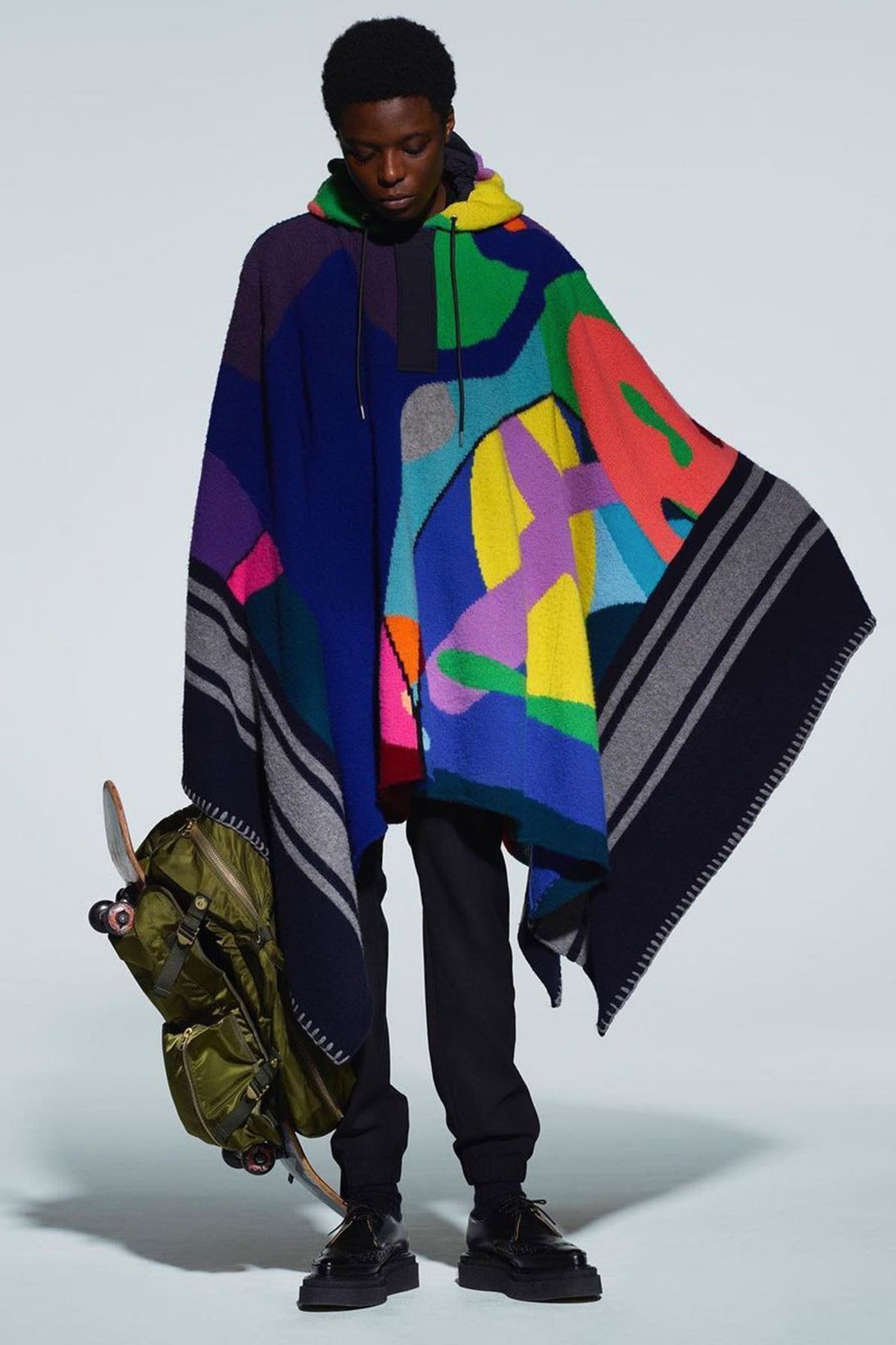 kaws sacai pre-fall collection collaboration shawl backpack