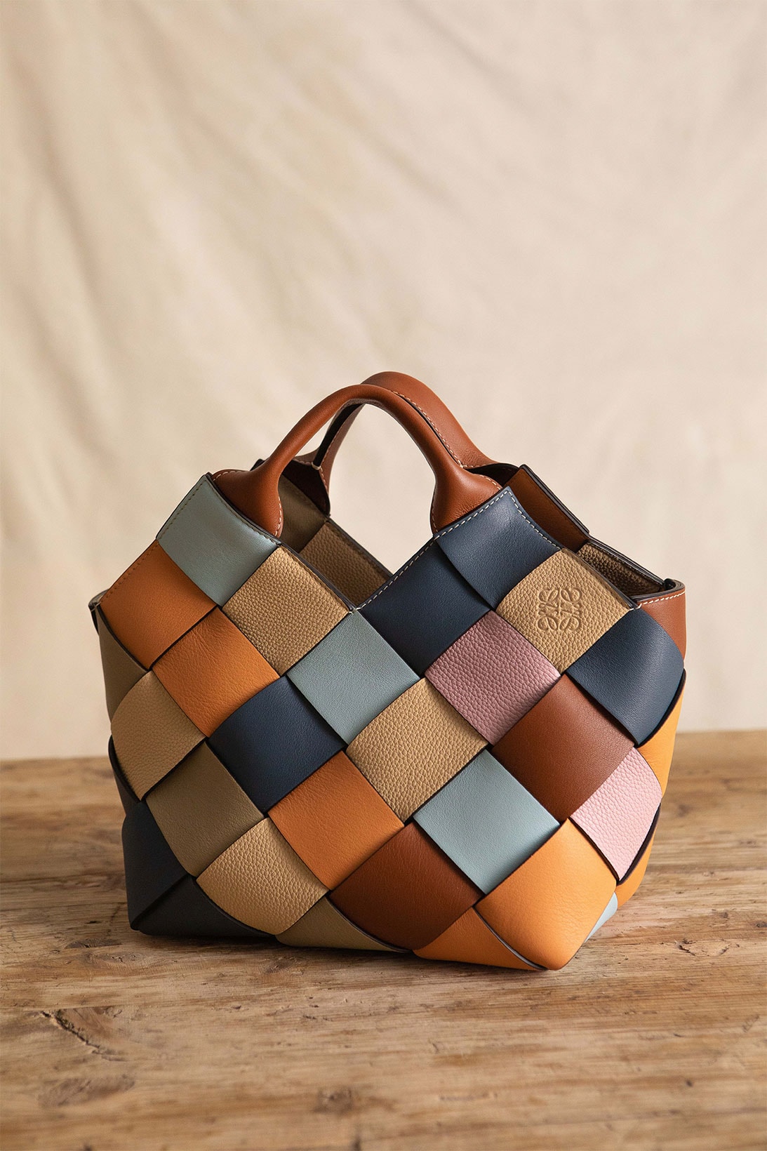 loewe the surplus project woven basket handbags sustainable orange blue beige brown