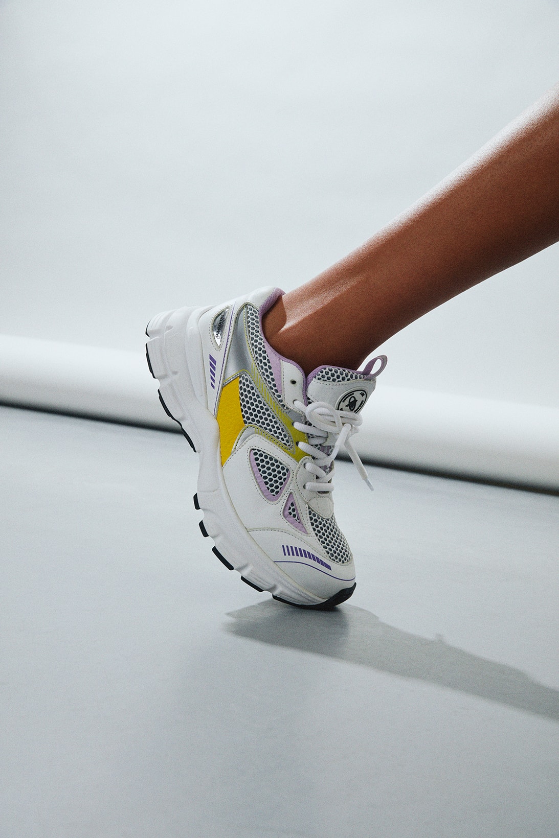 axel arigato marathon runner sneakers white yellow purple gray lateral