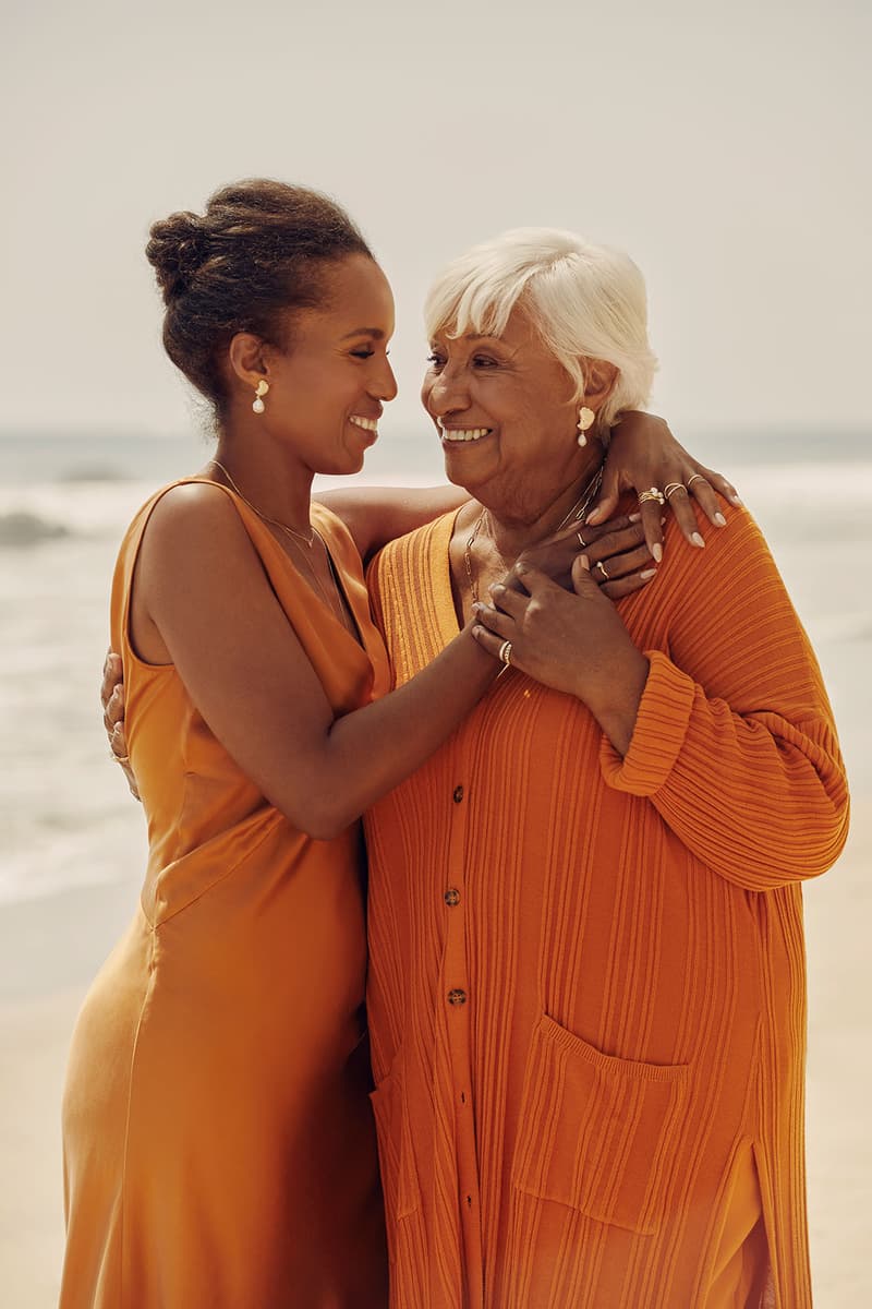 kerry washington aurate jewelry mothers day collection orange dress hugging