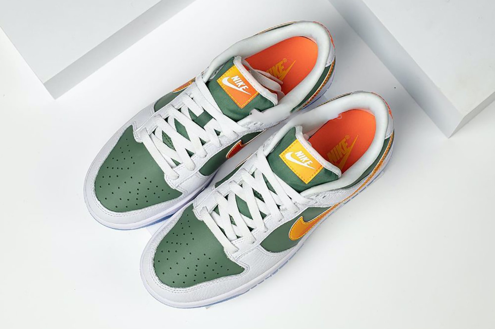 nike dunk low sneakers ny vs ny new york city green white orange footwear kicks shoes sneakerhead aerial top view insole