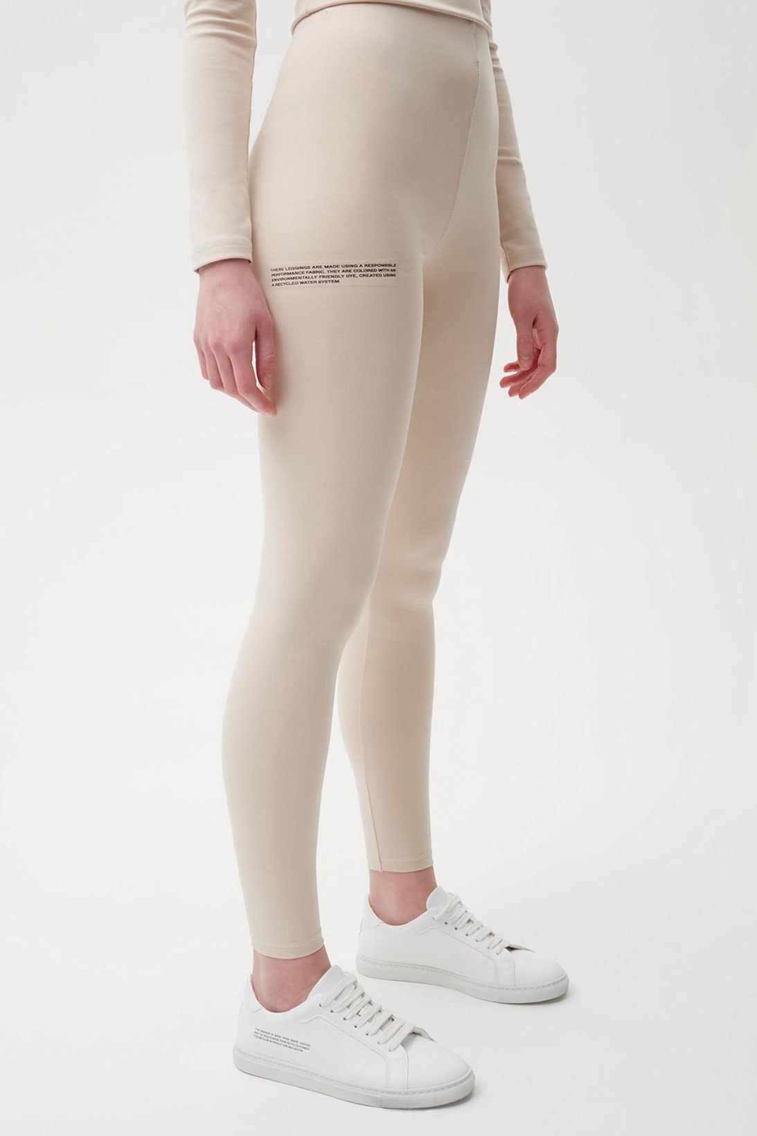 pangaia roica stretch athleisure sustainable collection turtleneck top leggings beige
