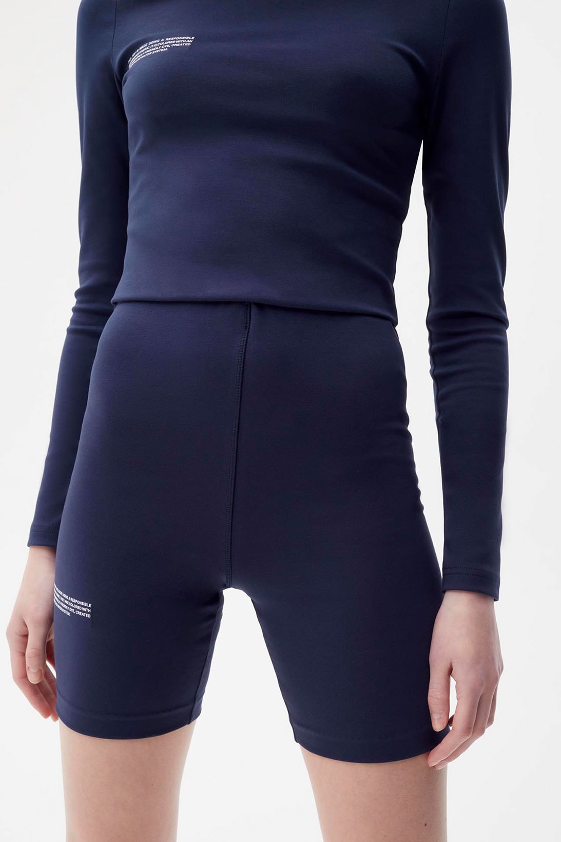 pangaia roica stretch athleisure sustainable collection turtleneck top bike shorts navy