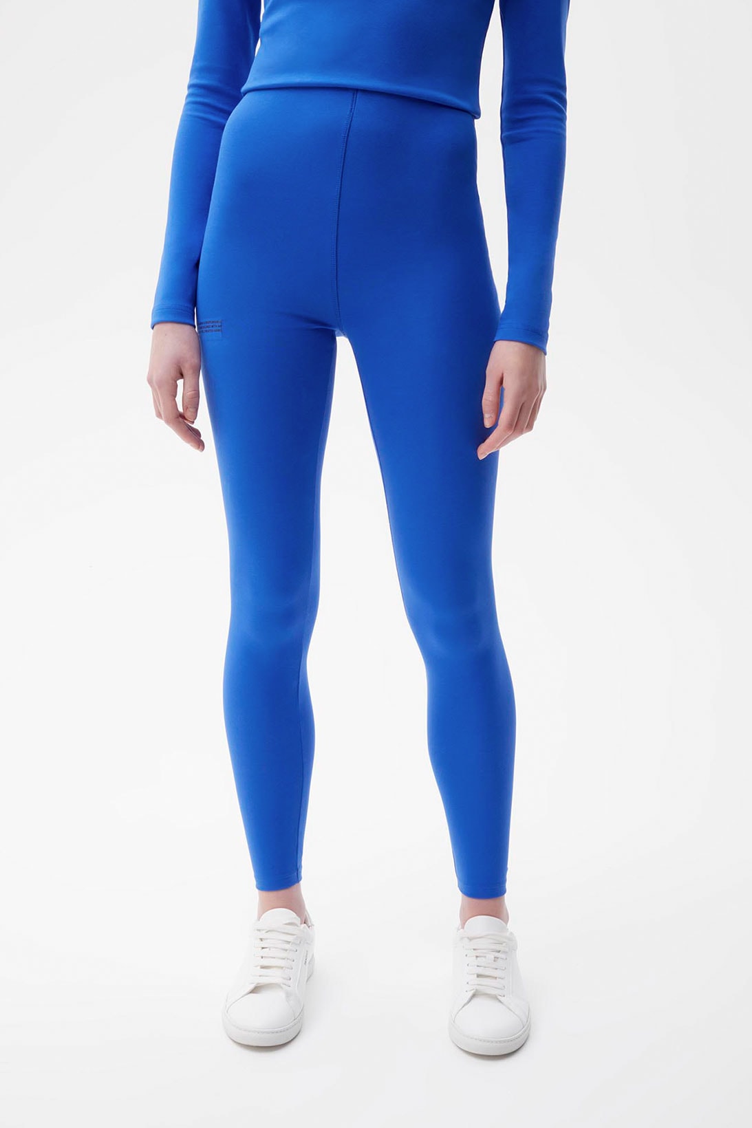 pangaia roica stretch athleisure sustainable collection turtleneck top leggings blue