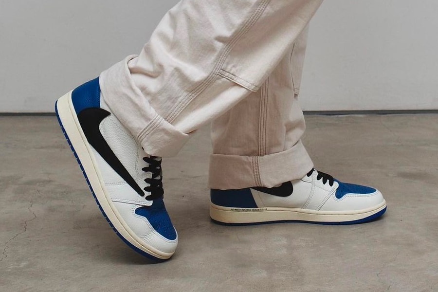 travis scott fragment design air jordan 1 aj1 high og military blue closer look on foot trousers reverse swoosh