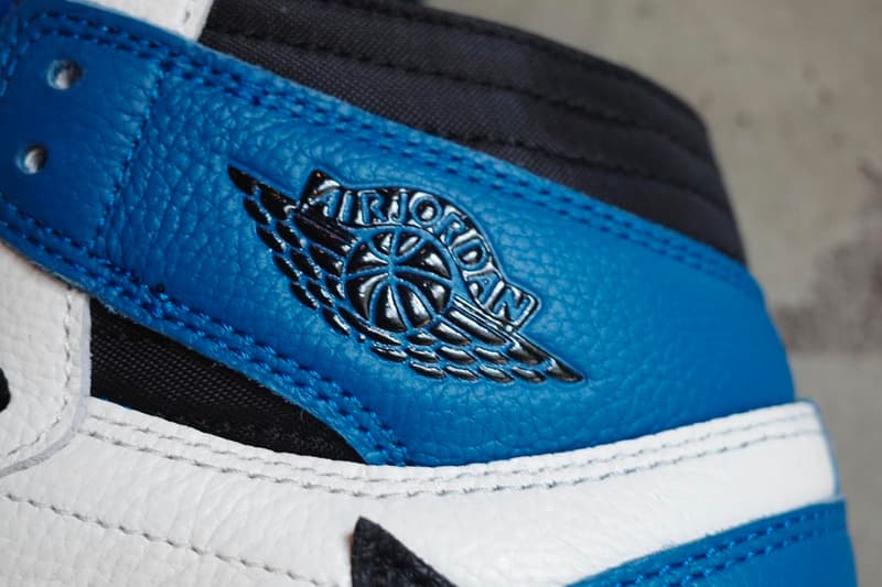 travis scott fragment design air jordan 1 aj1 high og military blue closeup emblem