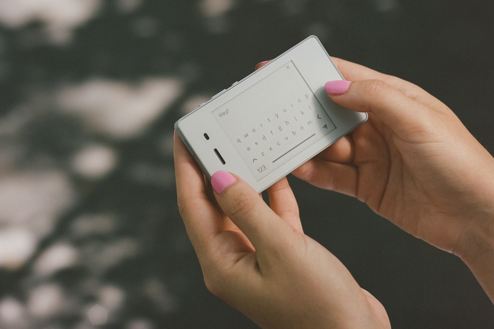 the light phone ii minimalist design tech hands messaging