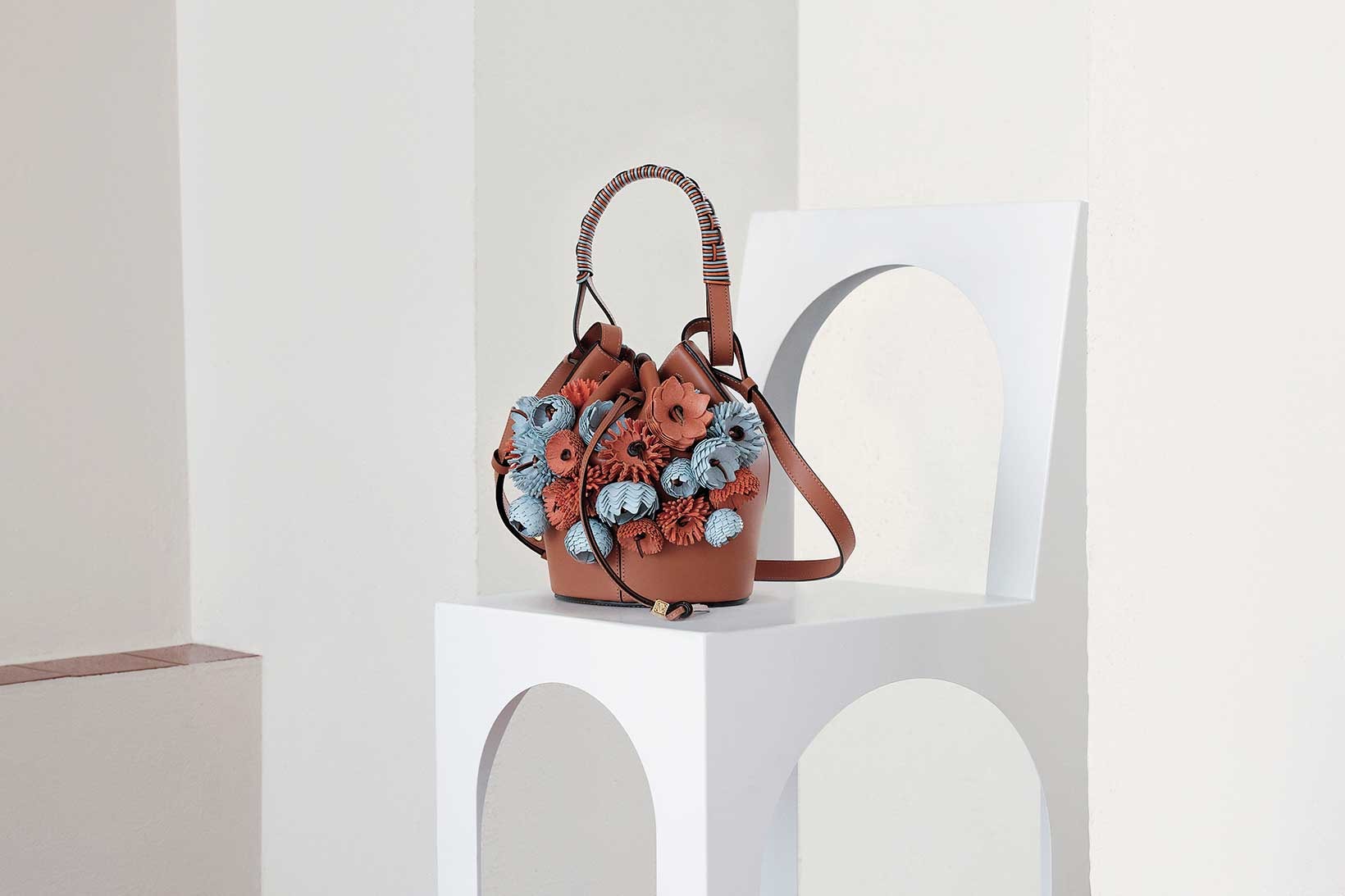 loewe sotheby weaves handbags collaboration accessories flowers 