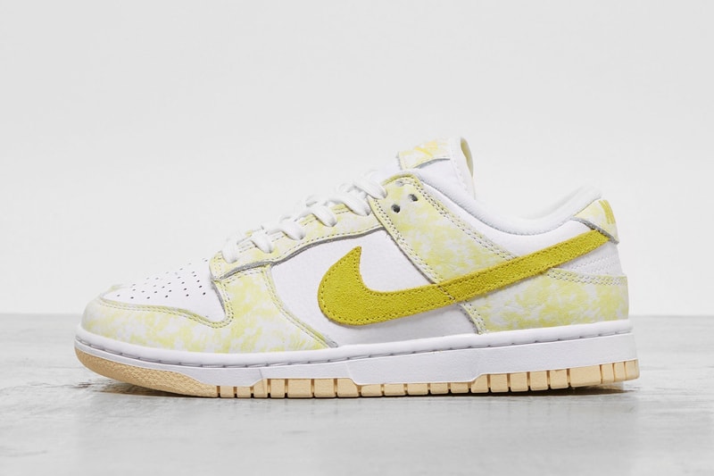 nike dunk low sneakers yellow strike details swoosh