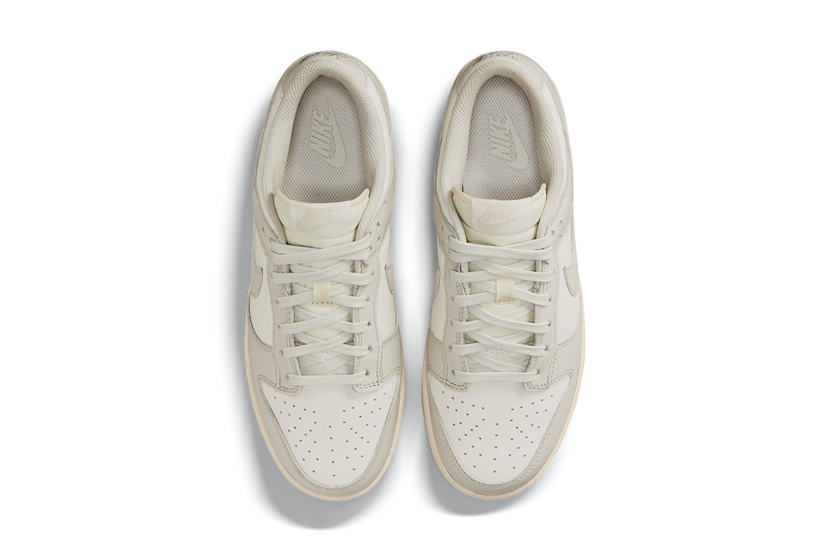 nike dunk low sneakers sail light bone cream white colorway footwear shoes kicks aerial top view insole