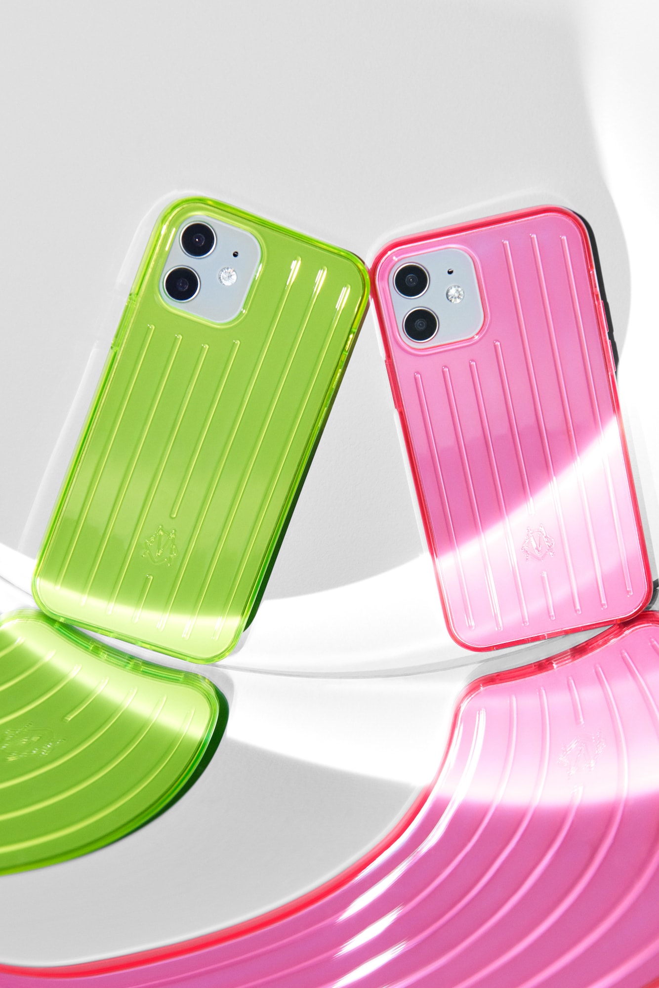 RIMOWA Releases New Neon Suitcase Range Pink Lime Transparent Travel Bags