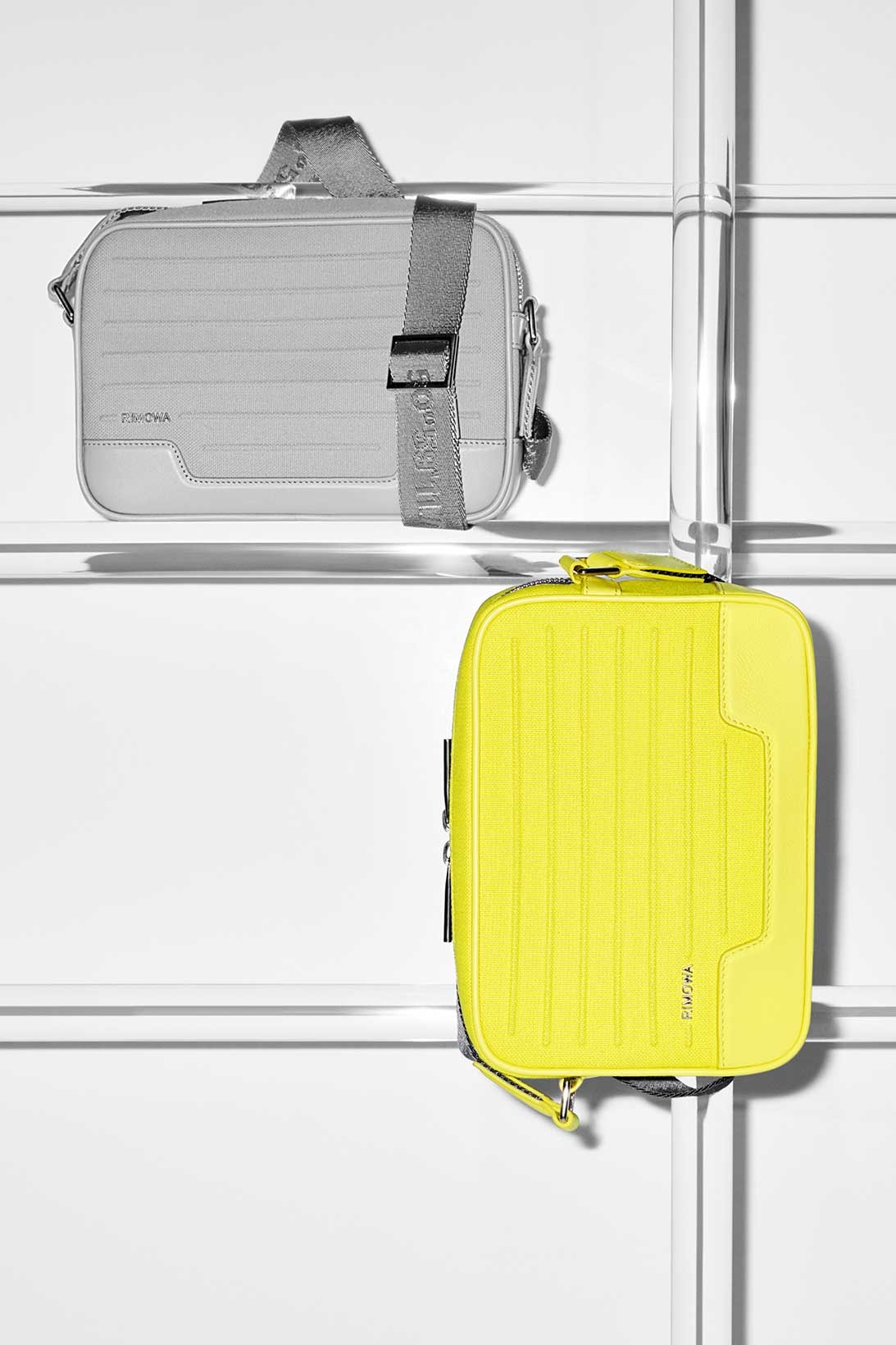 rimowa never still collection messenger silver yellow