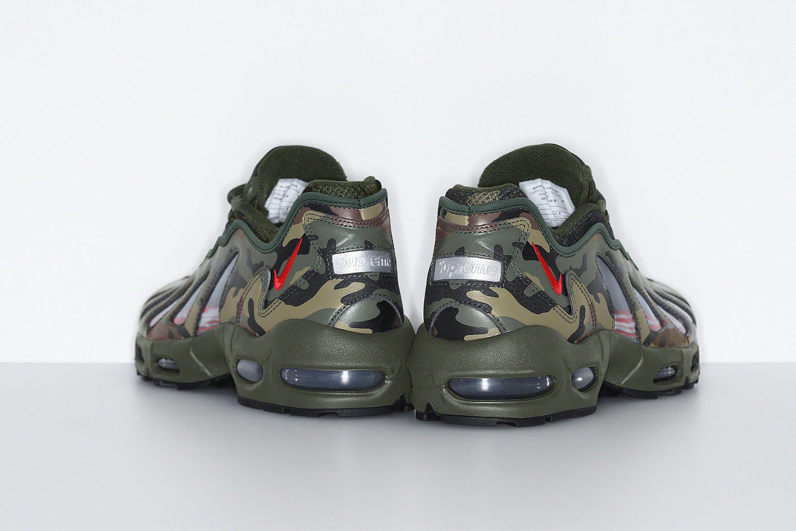 supreme nike air max am96 sneakers collaboration camo back heel details