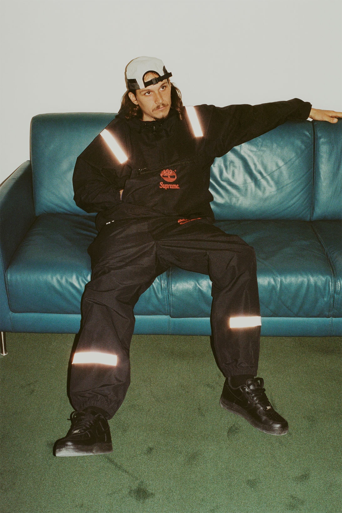 supreme timberland spring collaboration collection tracksuit logo couch sofa