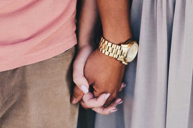 Couple Holding Hands Gold Watch