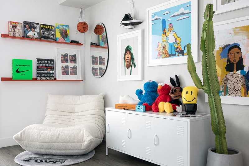 Victoria Adesanmi Home Office Culver City Los Angeles Loft Streetwear Pop Culture Kaws Seasame Street Plush Toy Sean Brown Jay-Z Rug Art Books Posters Interior Design Cactus