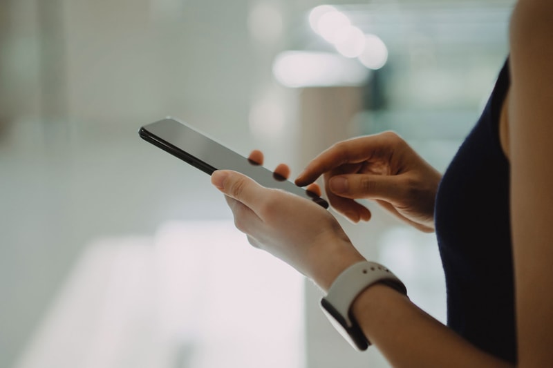 Woman Hand Using Phone Apple Watch