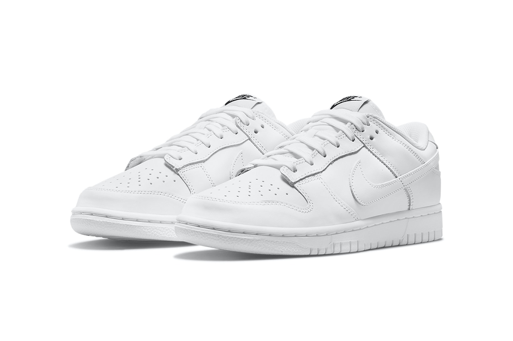 nike dunk low triple white sneakers minimal colorway footwear shoes kicks lateral