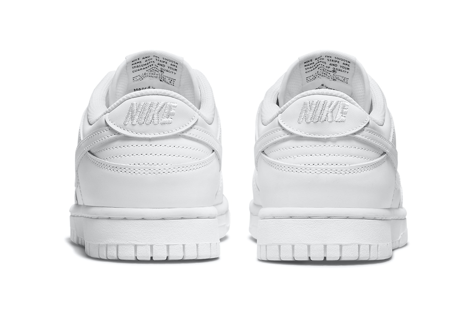 nike dunk low triple white sneakers minimal colorway footwear shoes kicks heel