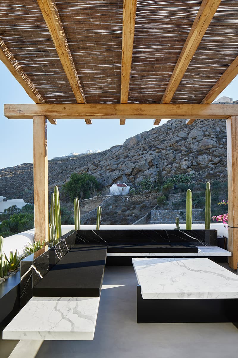 Saint Laurent Mykonos Greece Store Stairs White Marble Tables Seating Area Terrace