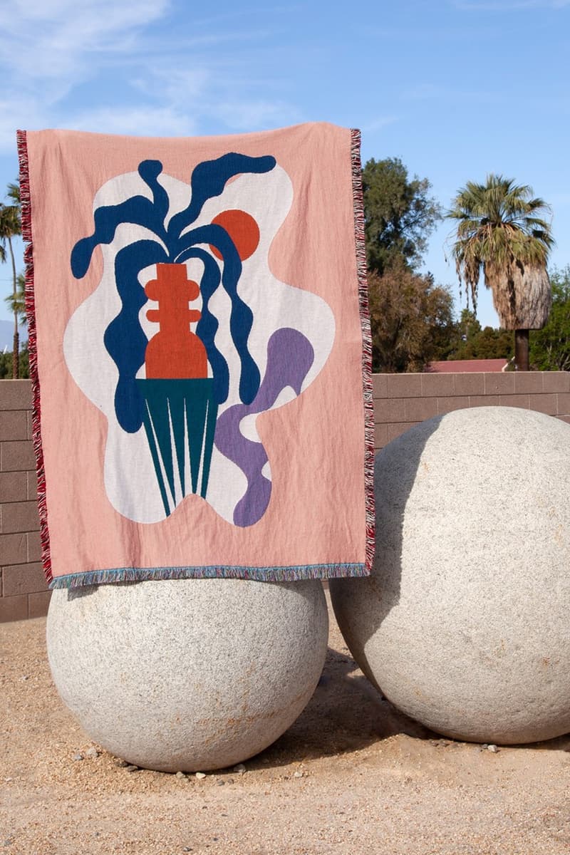 Slowdown Studio's "BADU" throw over two sphere rocks