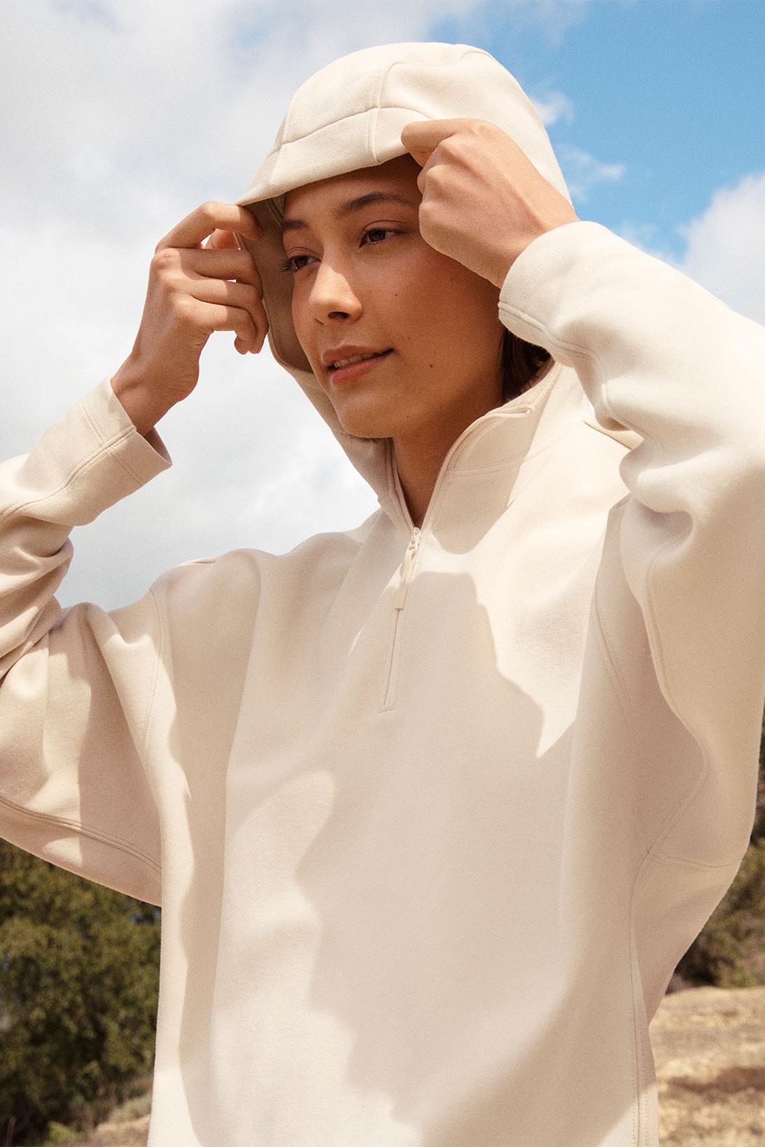 Uniqlo fw21 collection white hoodie on model