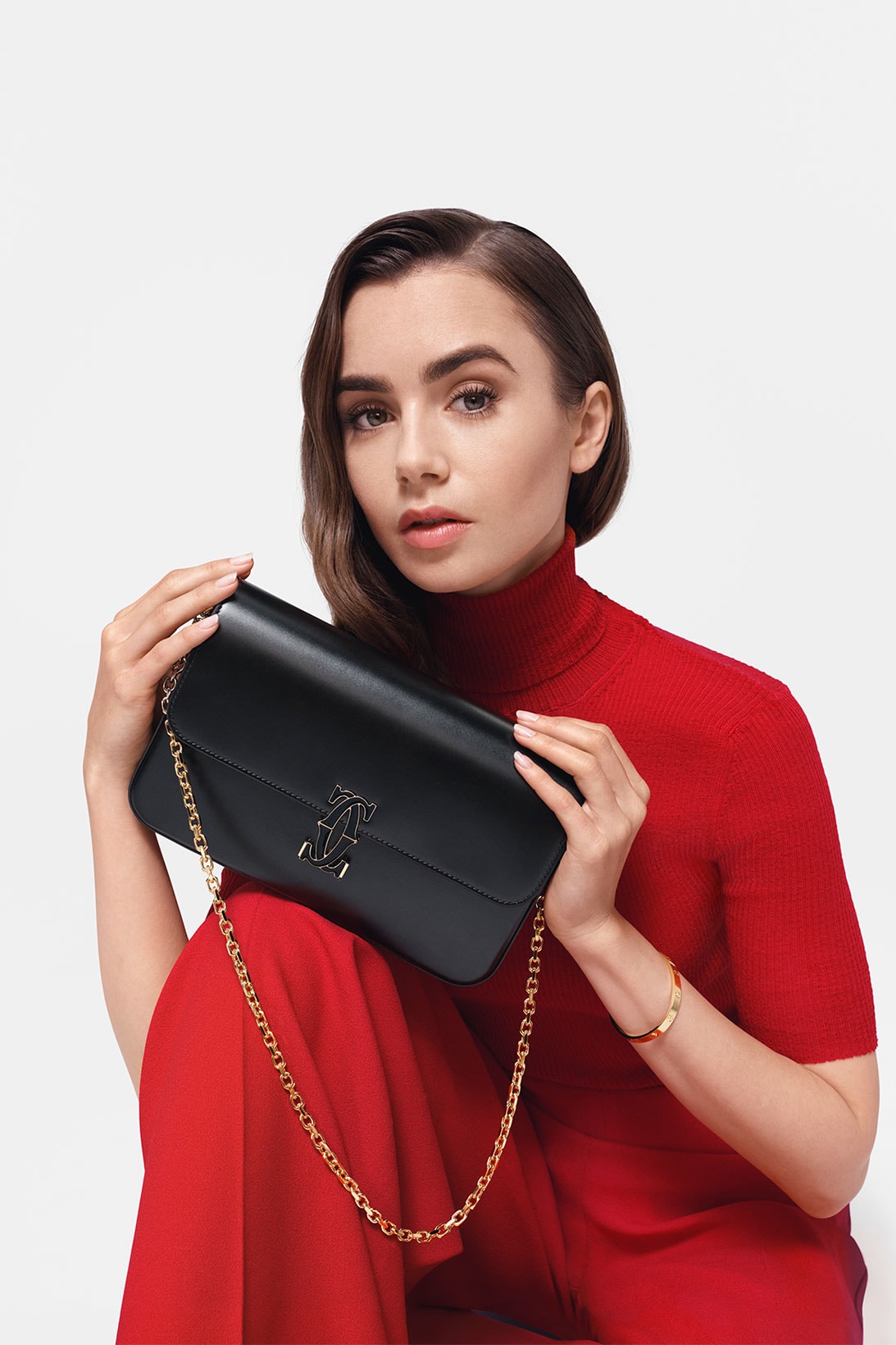 Double c de cartier bag in black with lily collins