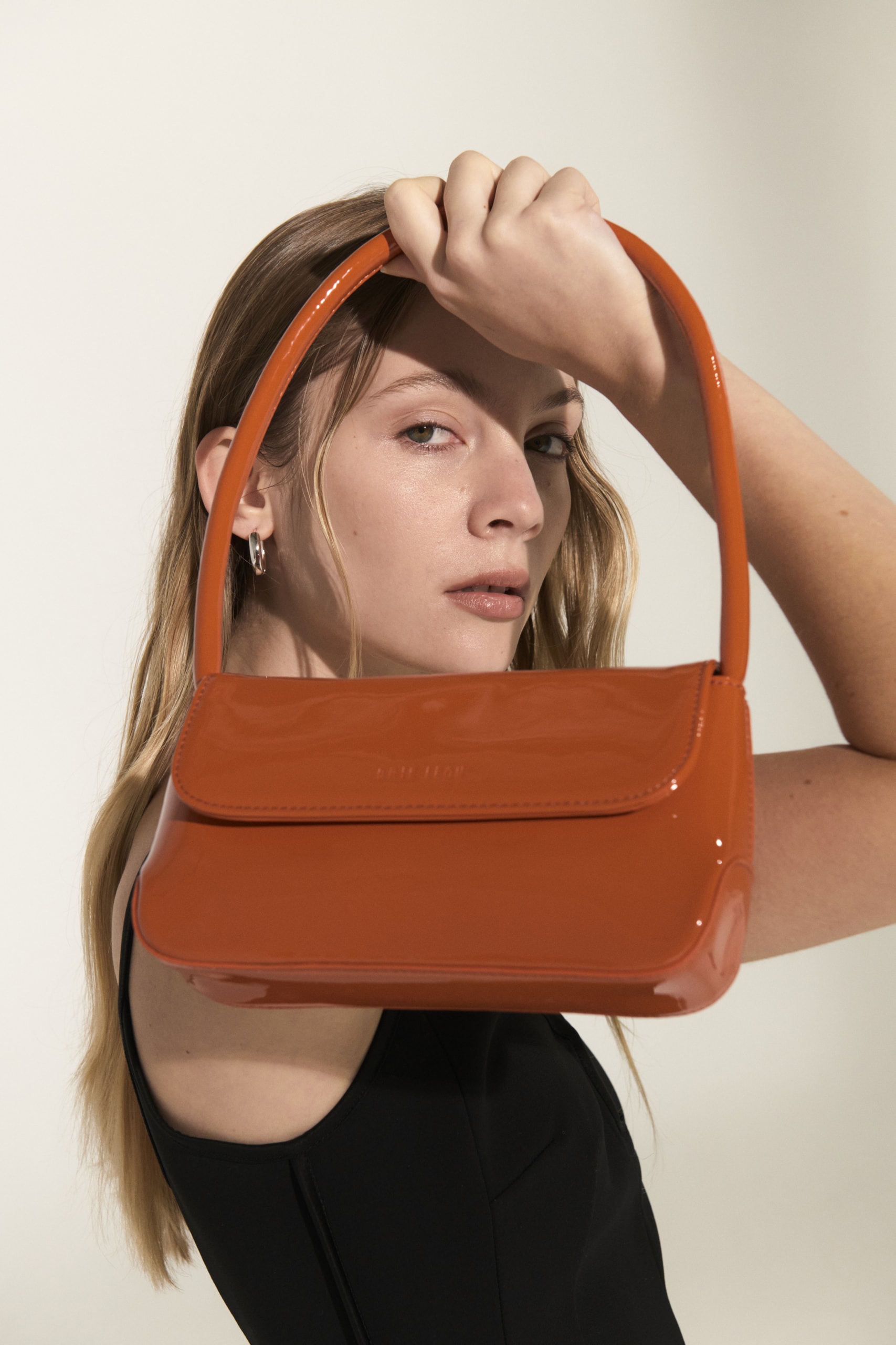 Brie Leon orange vegan leather handbag