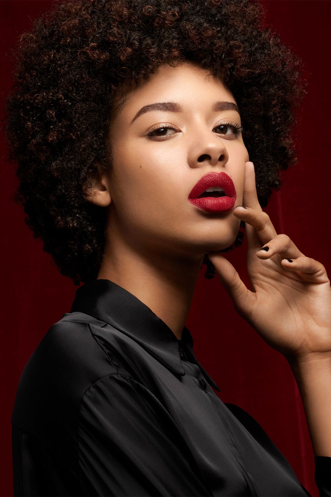 YSL Beauty “The Slim Velvet Radical” model deep red shade