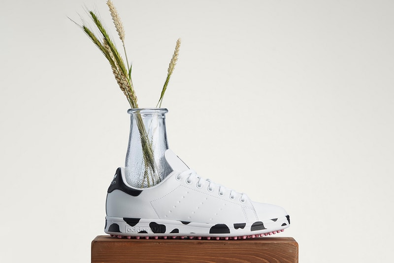adidas’ Stan Smith Golf Shoe with vase and plant side view
