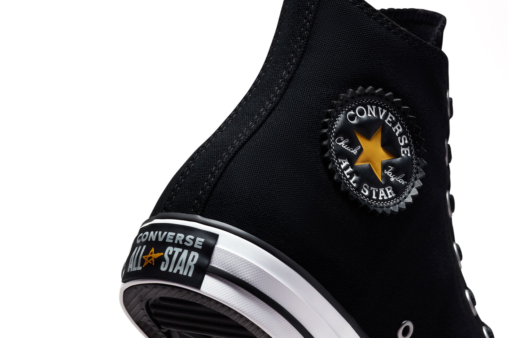 converse x basquiat chuck taylor all star heel close up black logo