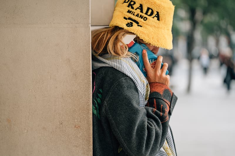 London Fashion Week SS22 Spring Summer 2022 Street Style Looks Outfits Influencer Prada Yellow Furry terrycloth Bucket Hat Moschino Jeremy Scott Phone Case