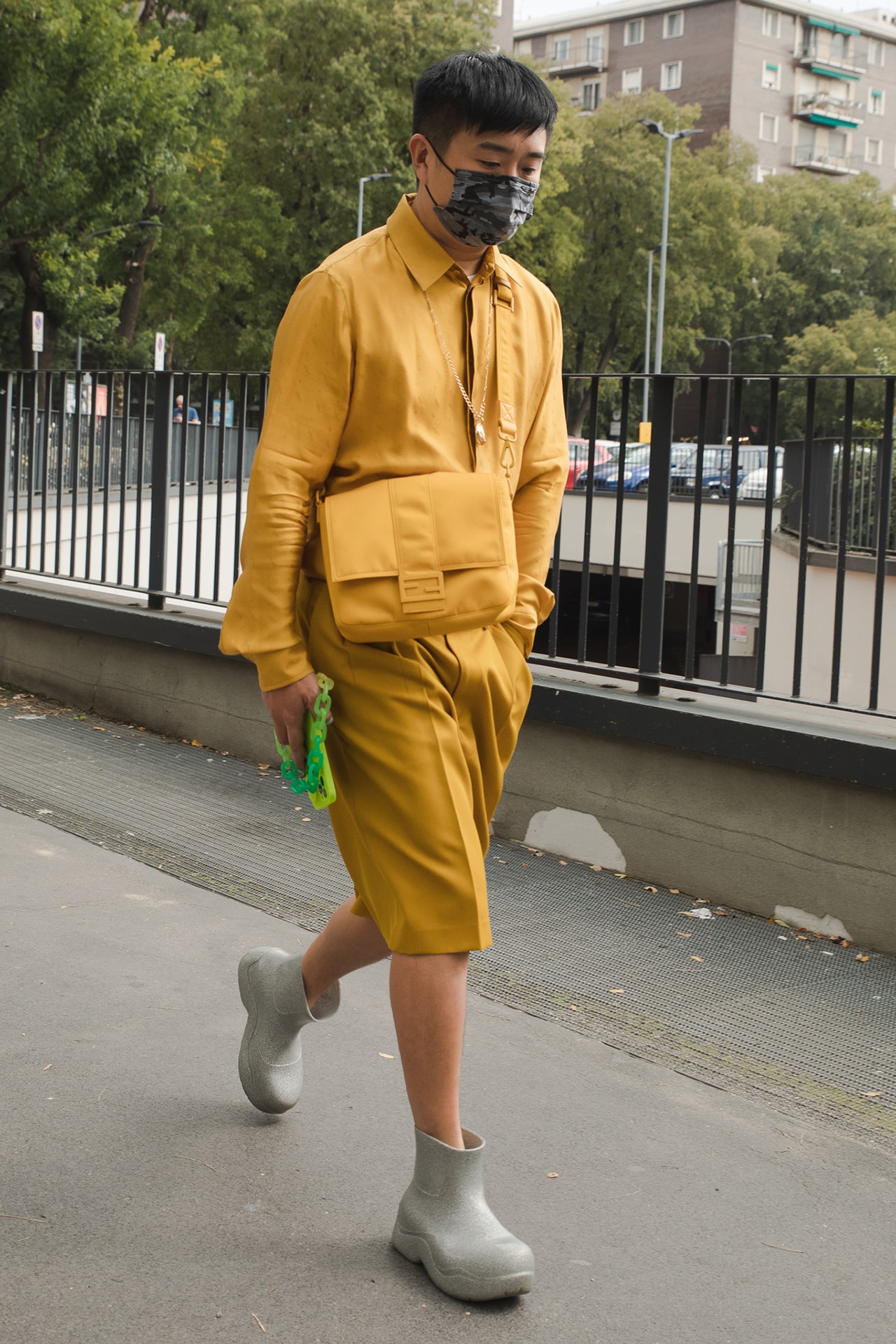 Milan Fashion Week Street Style Spring Summer 2022 SS22 Influencer Outfit Fendi Bag Yellow Bottega Veneta Puddle Boots