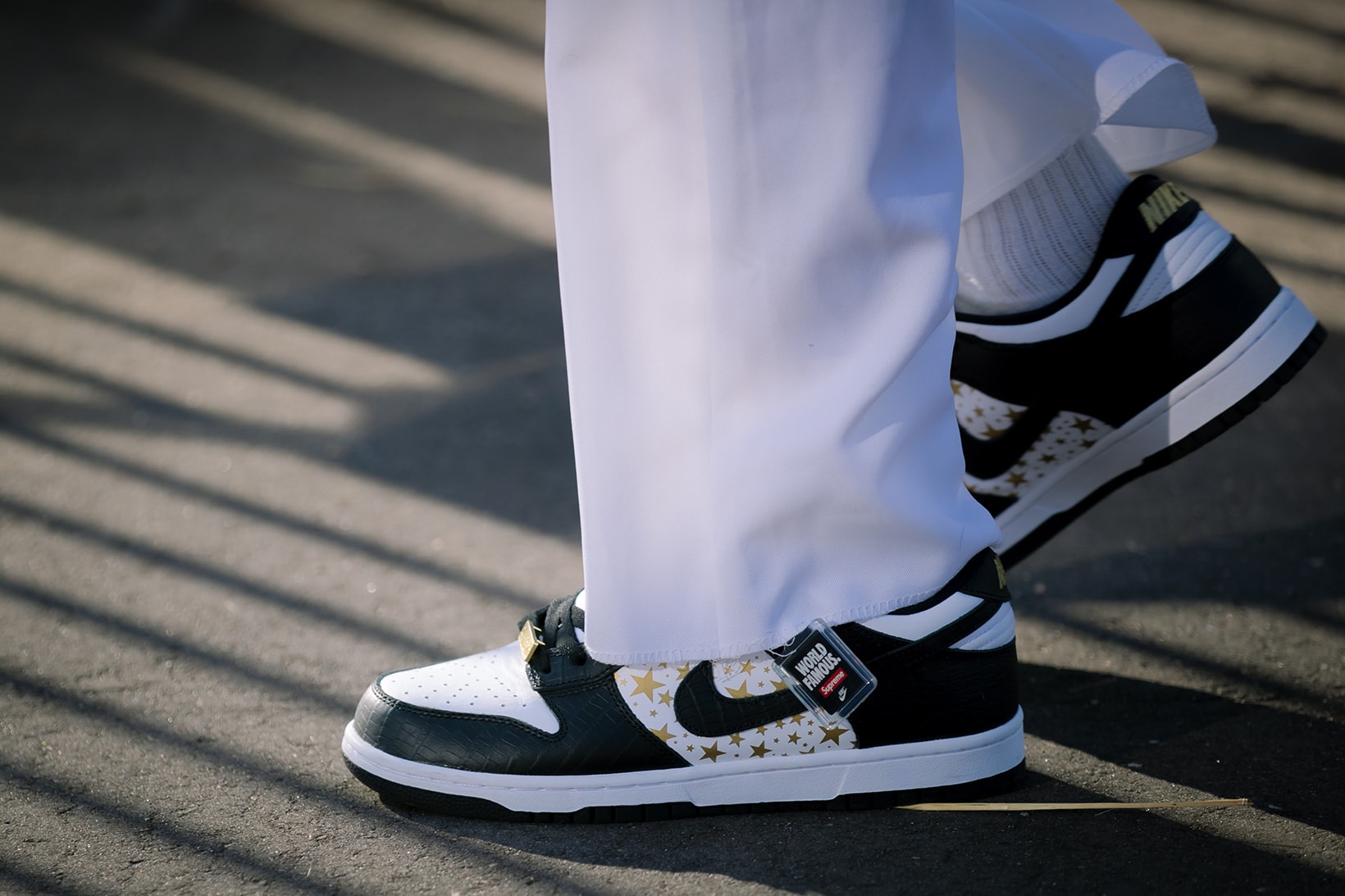 Supreme Nike Stars Sneakers SB Dunk Low Black White New York Fashion Week SS22 Best Street Style Trends Spring Summer 2022 Influencer