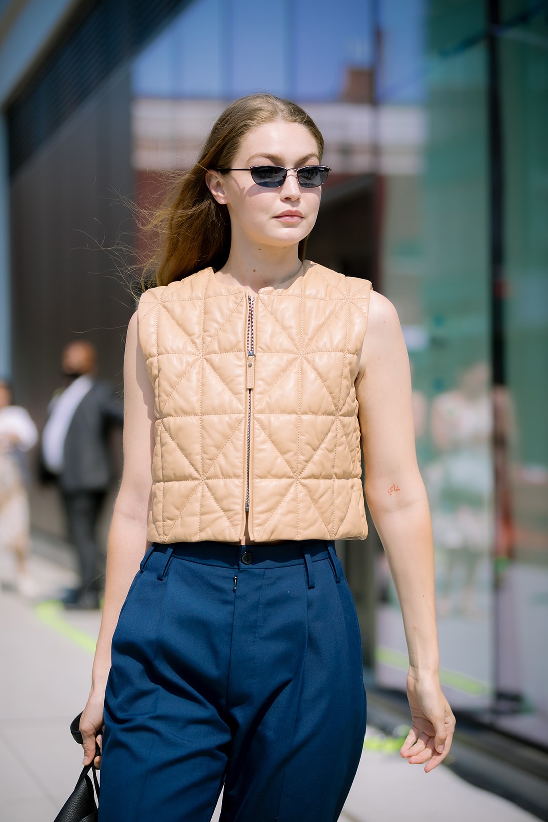 Gigi Hadid Beige Quilted Vest Sunglasses Model Celebrity Outfit New York Fashion Week SS22 Best Street Style Trends Spring Summer 2022 Influencers