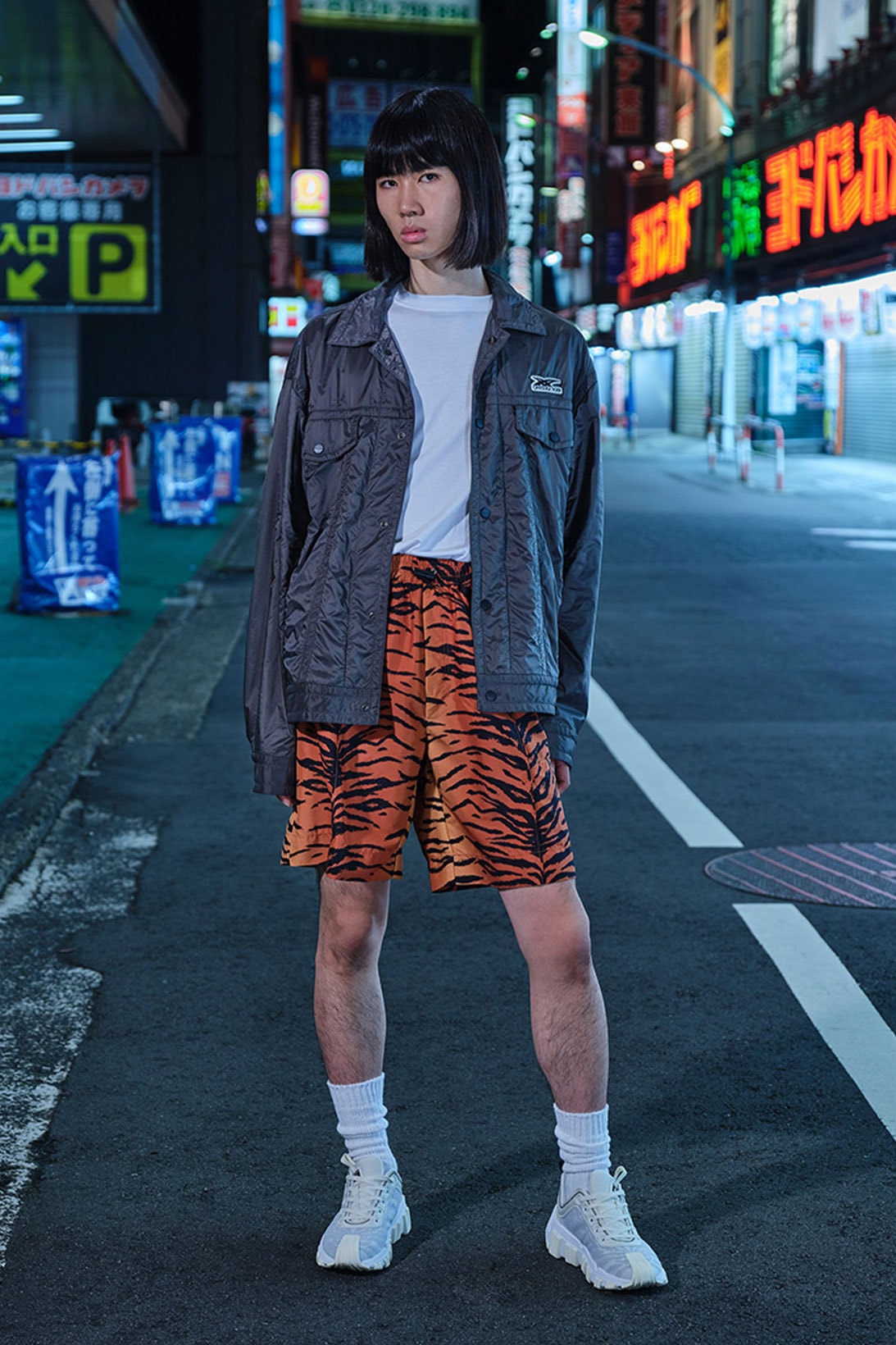 onitsuka tiger ss22 collection milan tokyo orange tiger print shorts gray jacket