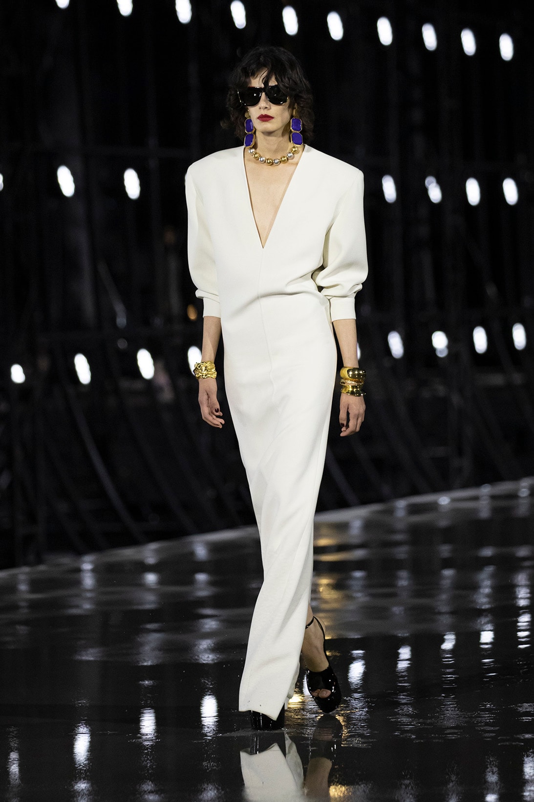 Yves Saint Laurent sends silky evening gowns down Eiffel Tower runway