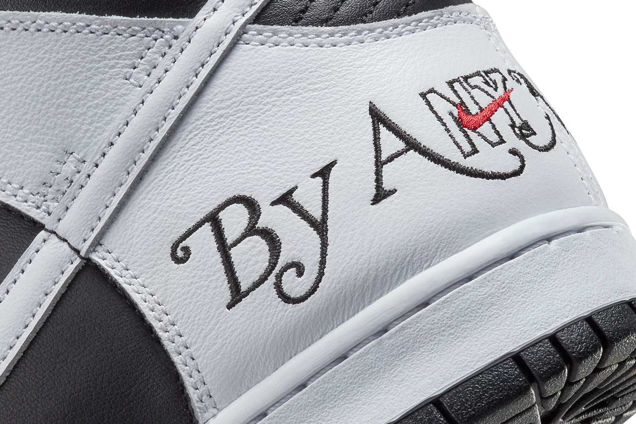 Supreme x Nike SB Dunk High “By Any Means” in "Black/White" close up heel view