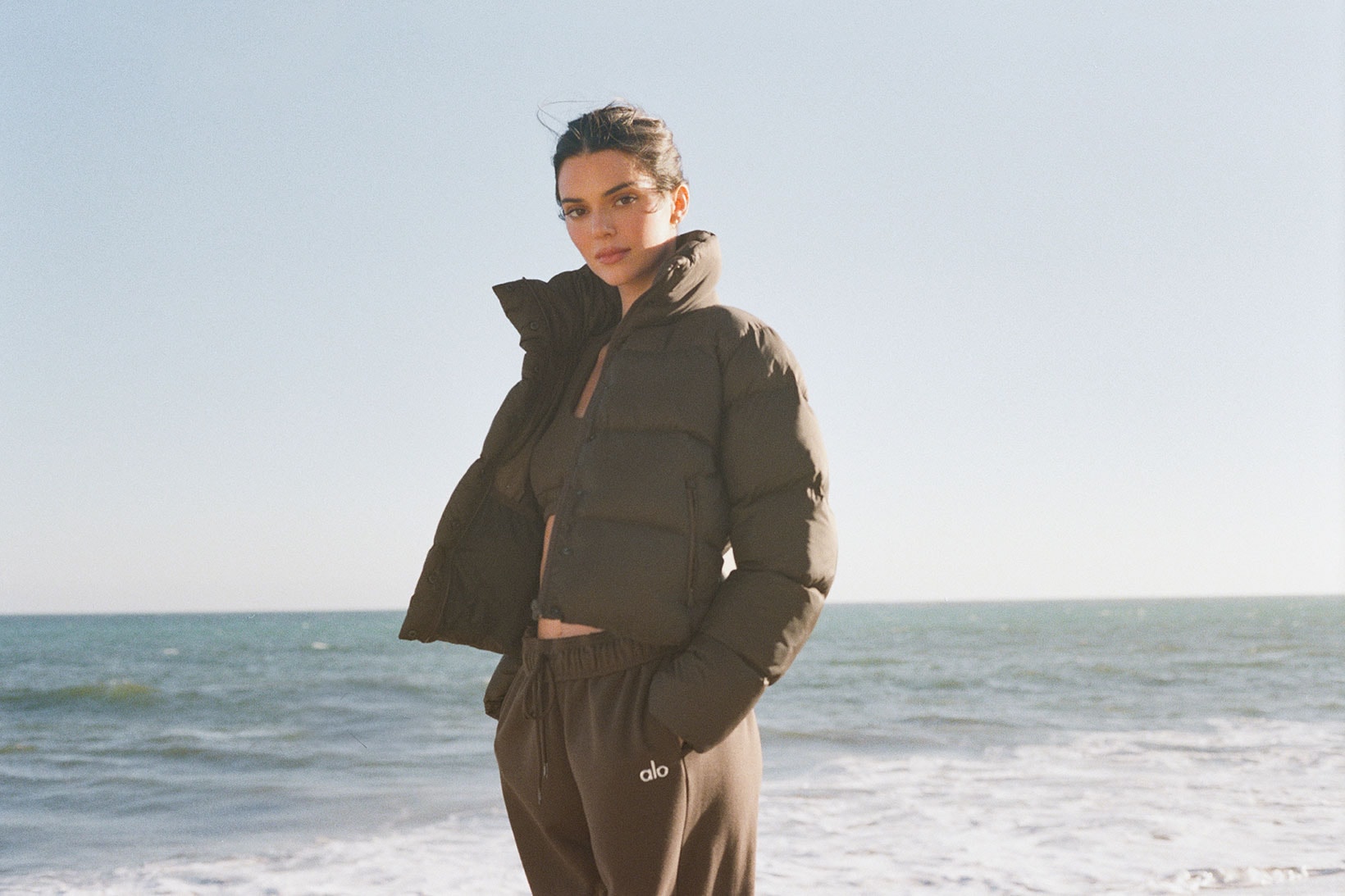 Alo Yoga Kendall Jenner Holiday Jackets and Coats Campaign Puffer Beach Sweats