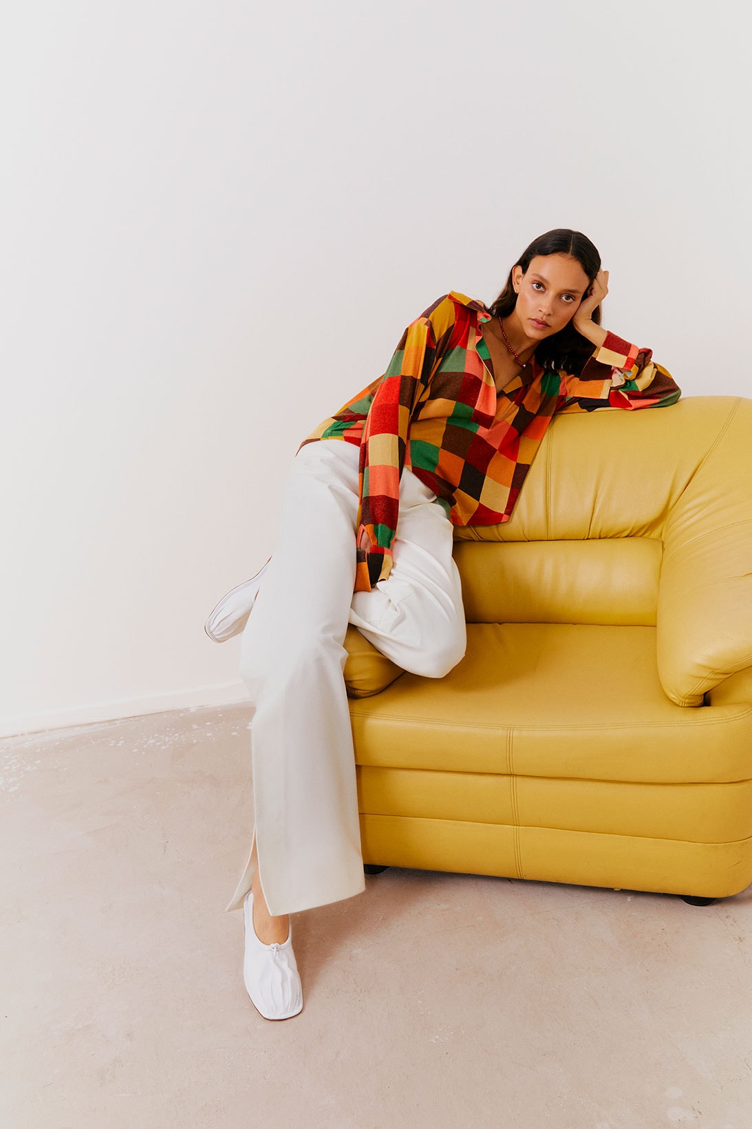 Anim Fall/Winter 2021 Collection Campaign Knit Sweater Sofa White Trousers