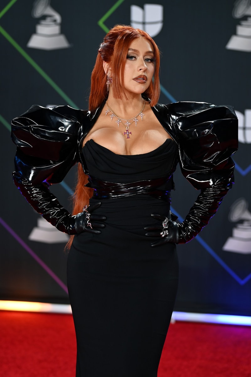 black leather red carpet christina aguilera red hair posing latin grammys