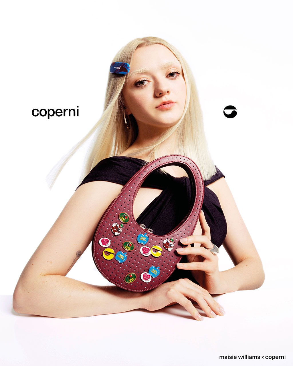 maisie williams coperni collaboration sustainable handbags vegan apple leather mini crossbody berry customizable pins