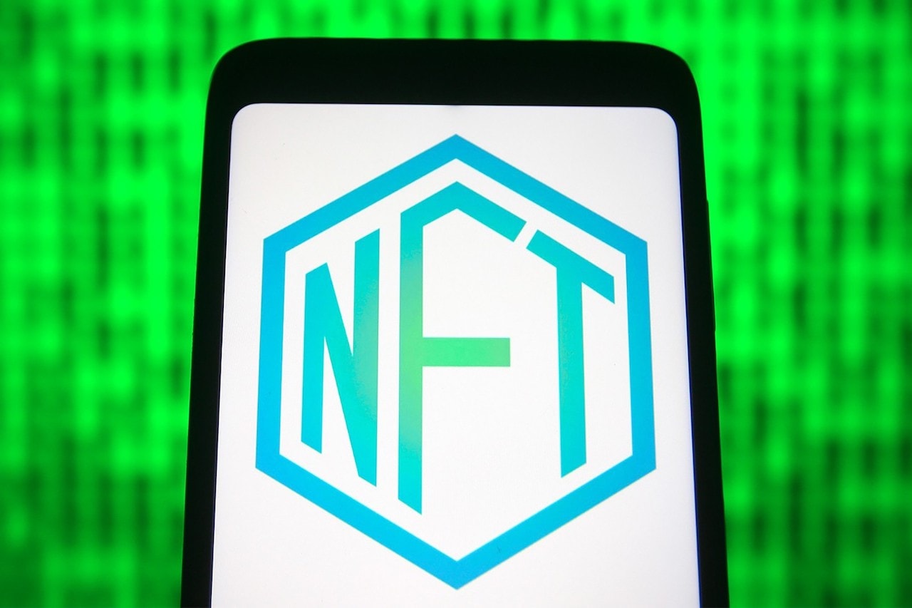nft phone screen non-fungible token green blue