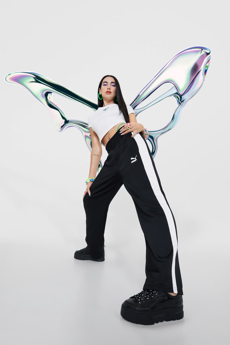 dua lipa puma campaign flutur butterfly footwear apparel posing black sneakers white shirt