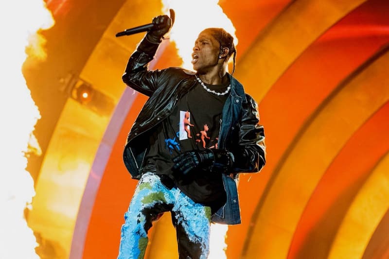 travis scott performing on stage leather outfit chain graphic tee astroworld festival november hulu documentary