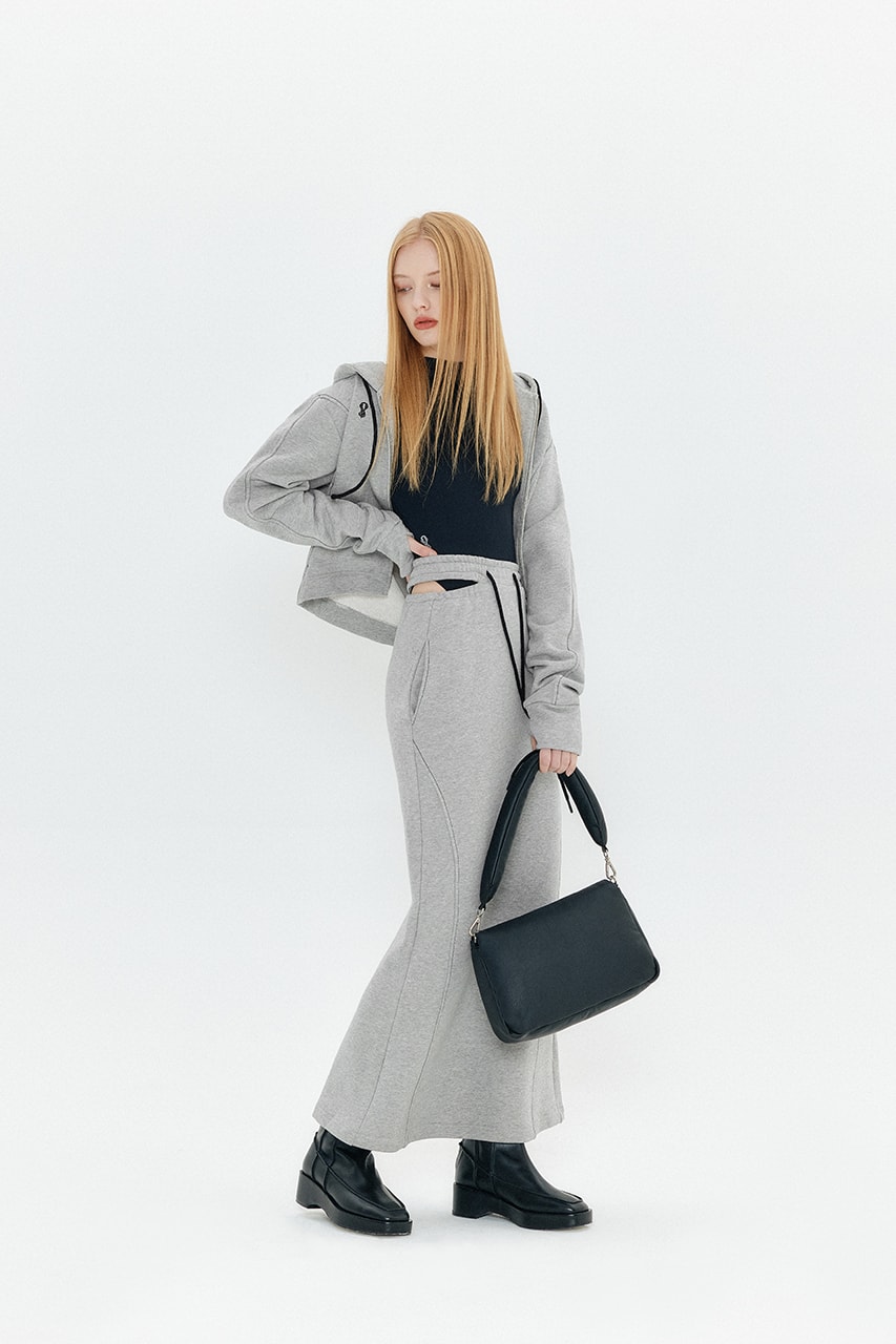 yuse fall winter 2021 2022 collection gray maxi skirt hand bag bolero knit