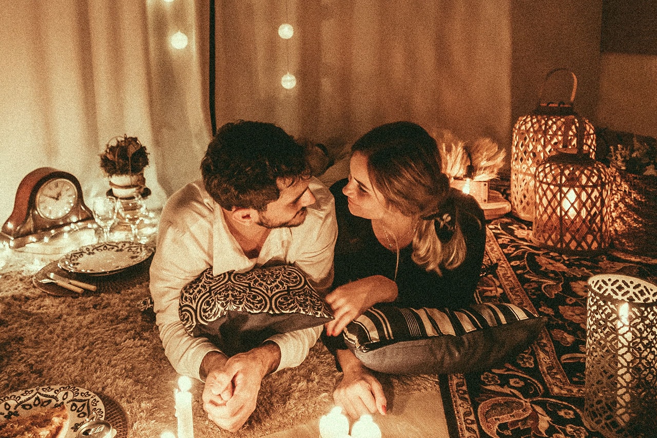 Couple on Romantic Candlelit Date 