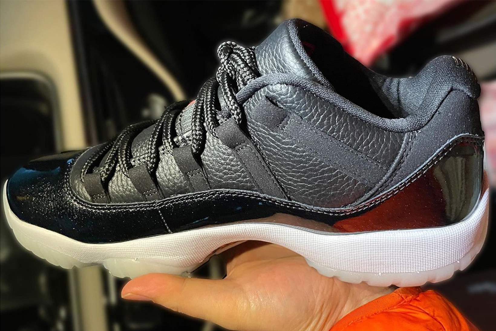 Nike Air Jordan 11 Low "72–10" Sneakers Black Gym Red Side View
