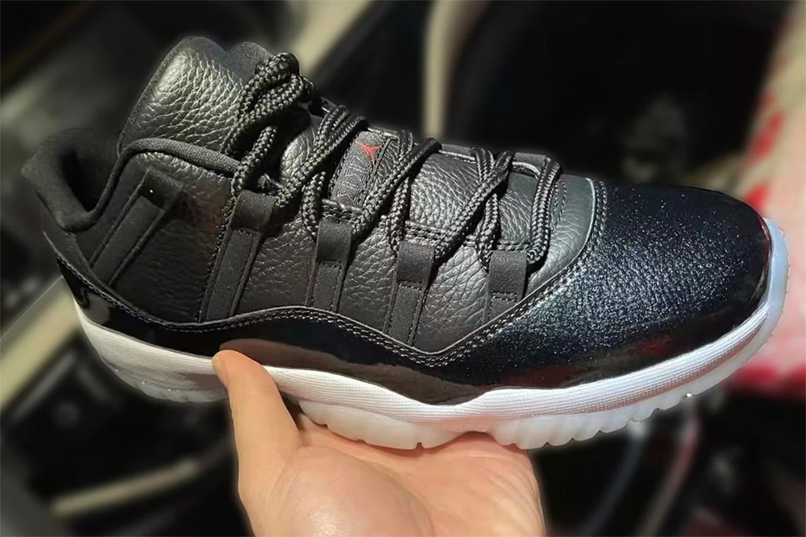 Nike Air Jordan 11 Low "72–10" Sneakers Black Gym Red Tumbled Leather Upper