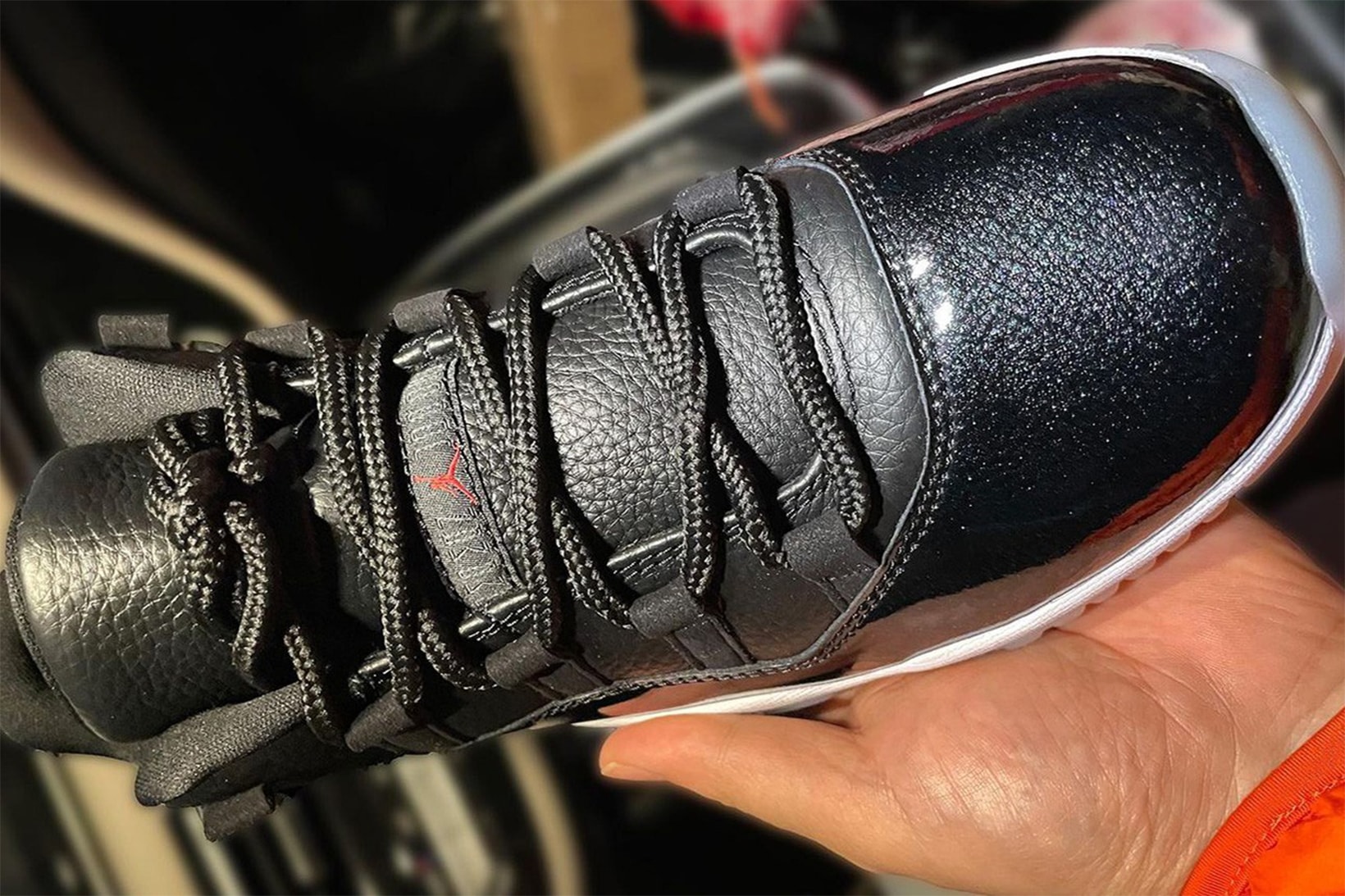 Nike Air Jordan 11 Low "72–10" Sneakers Black Gym Red Top View